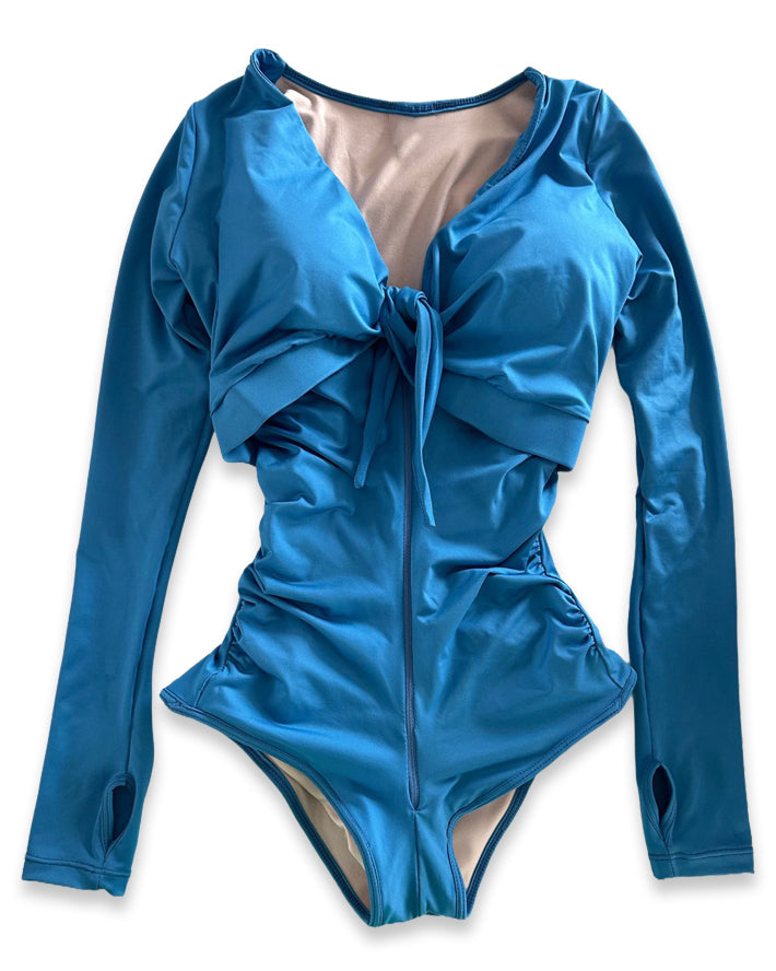Traje de baño manga larga con faja reductora de abdomen.