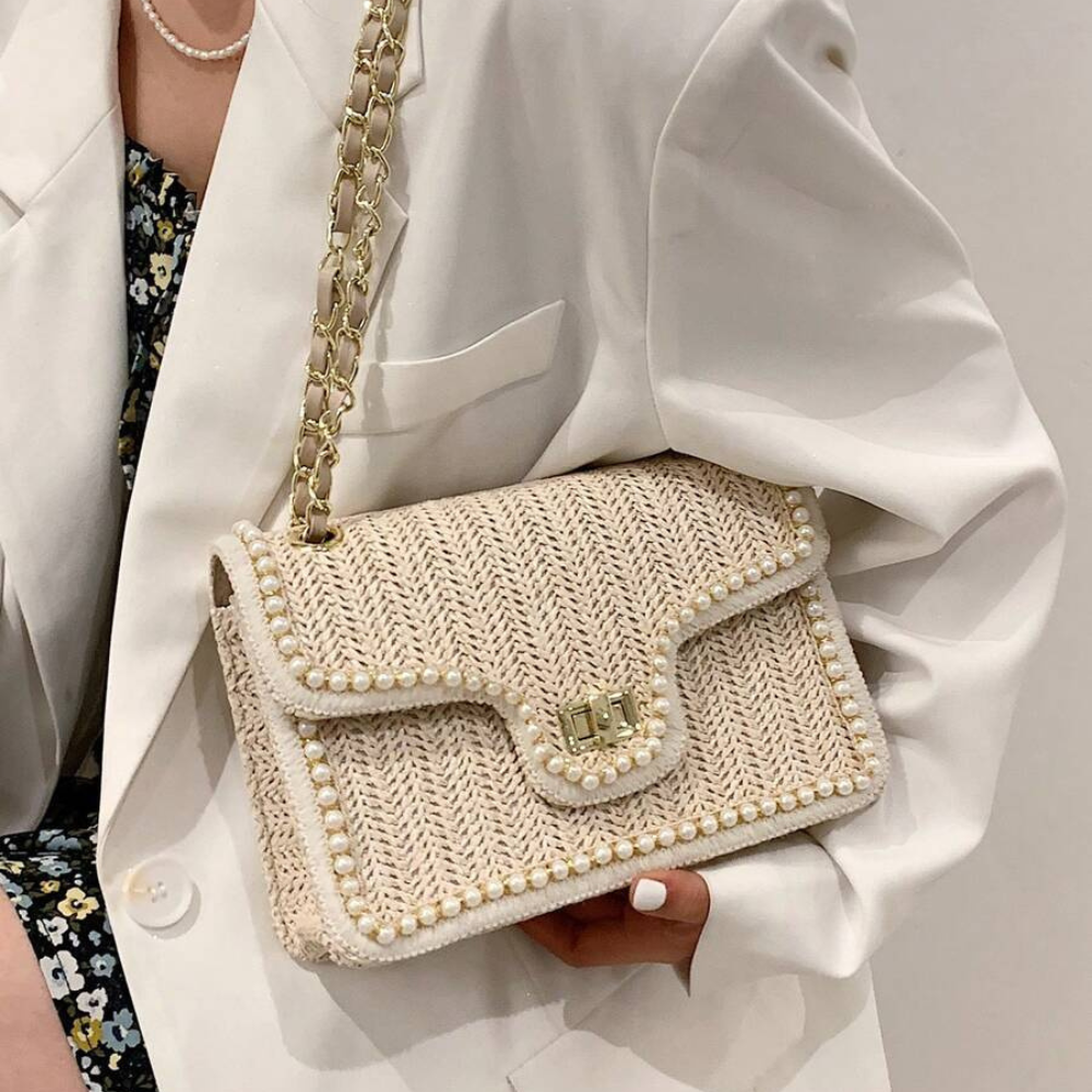 Bolso de mano bohemio con perlas