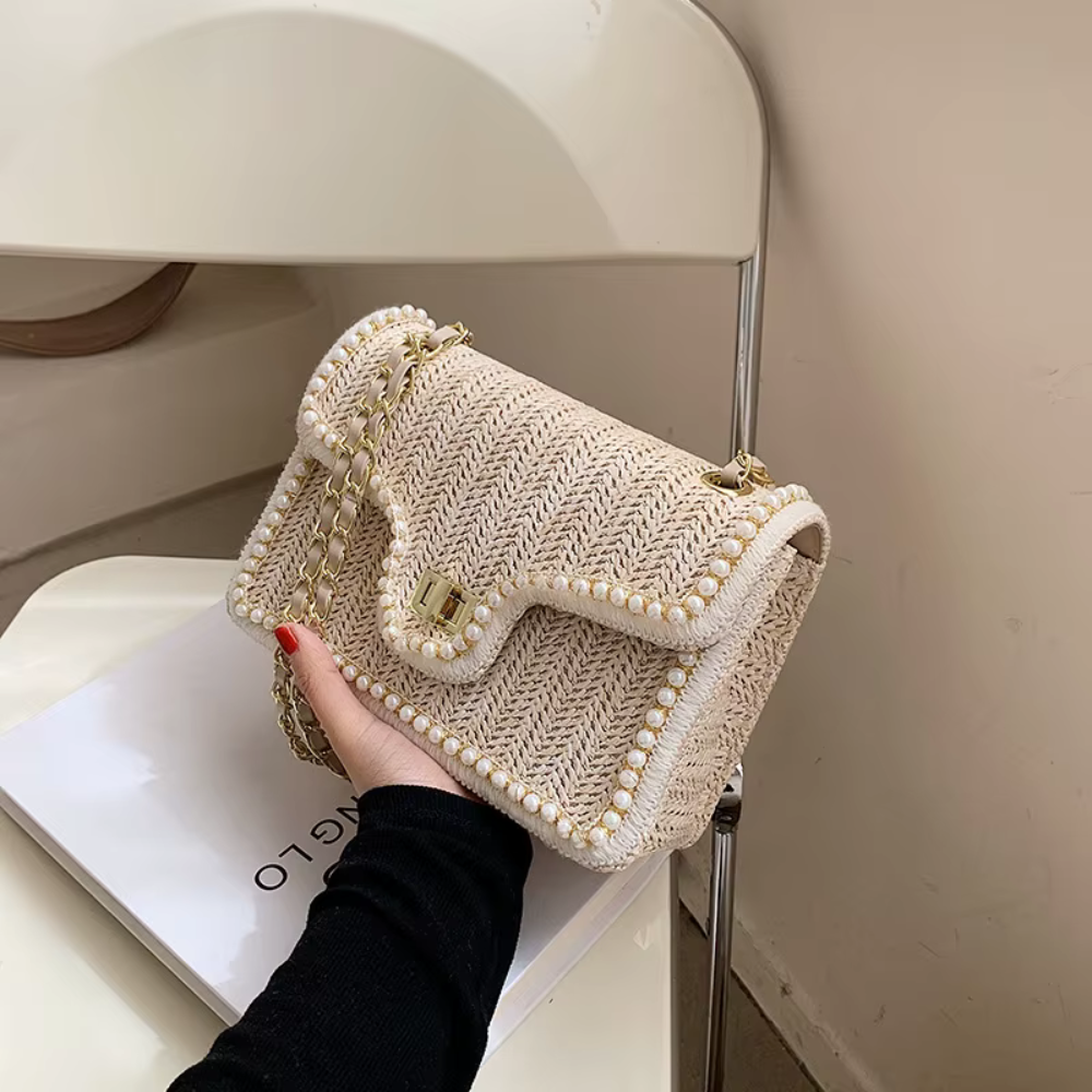 Bolso de mano bohemio con perlas