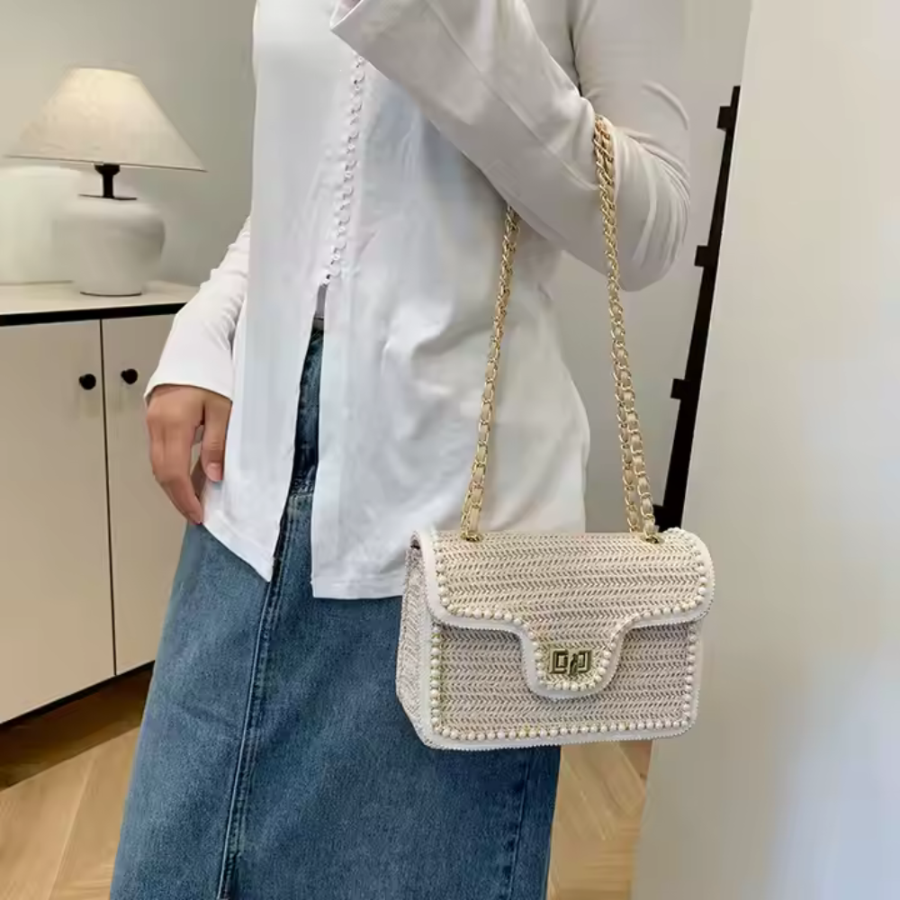 Bolso de mano bohemio con perlas