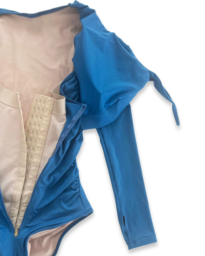 Traje de baño manga larga con faja reductora de abdomen.