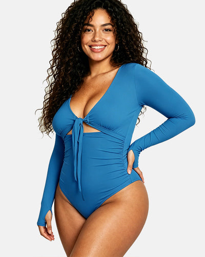 Traje de baño manga larga con faja reductora de abdomen.
