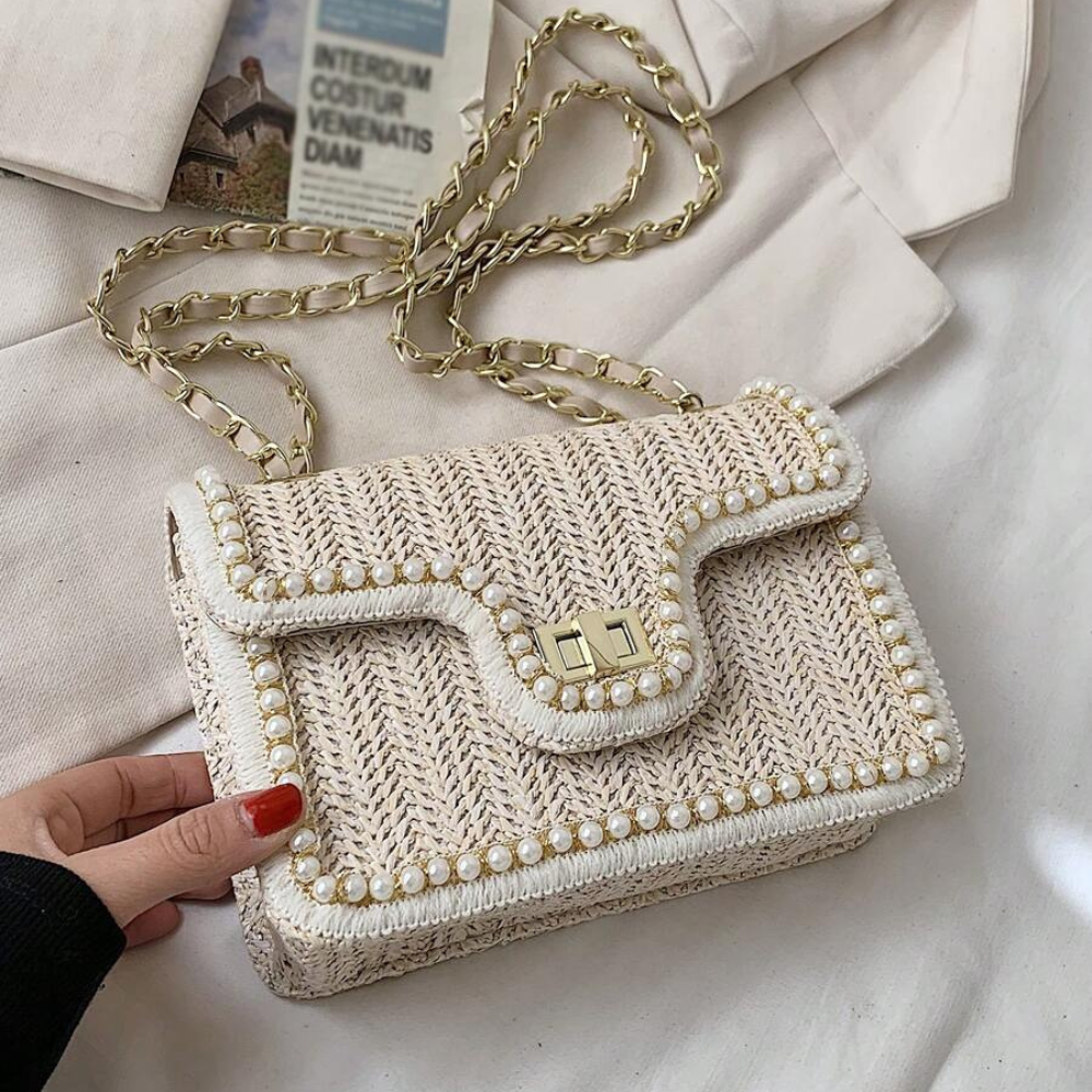 Bolso de mano bohemio con perlas